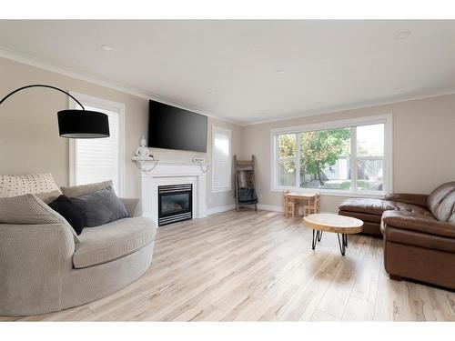 139 Laffont Way Ne, Fort Mcmurray, AB - Indoor Photo Showing Living Room With Fireplace