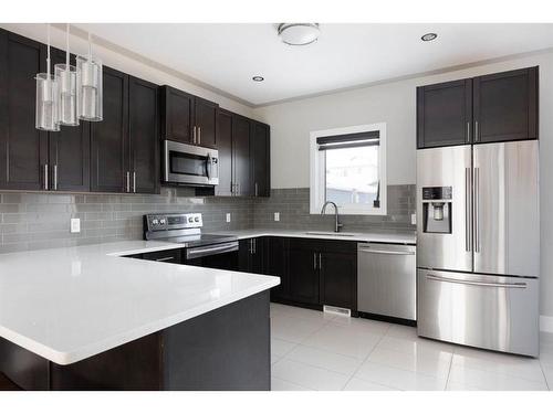 176 Siltstone Place, Fort Mcmurray, AB - Indoor Photo Showing Kitchen With Upgraded Kitchen