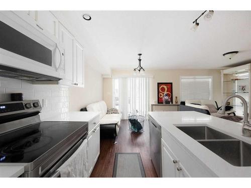 4-248C Grosbeak Way, Fort Mcmurray, AB - Indoor Photo Showing Kitchen With Double Sink