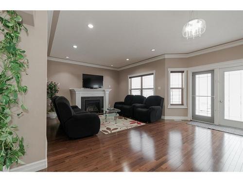 159 Killdeer Way, Fort Mcmurray, AB - Indoor Photo Showing Living Room With Fireplace