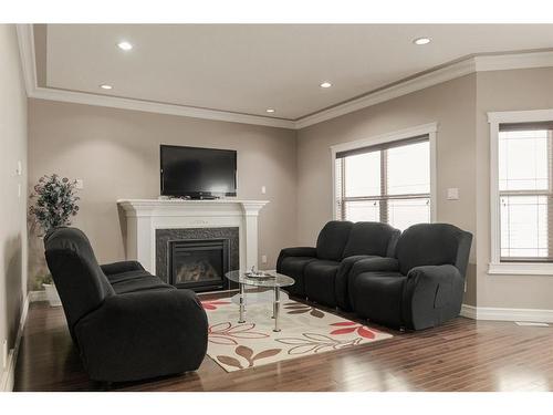 159 Killdeer Way, Fort Mcmurray, AB - Indoor Photo Showing Living Room With Fireplace