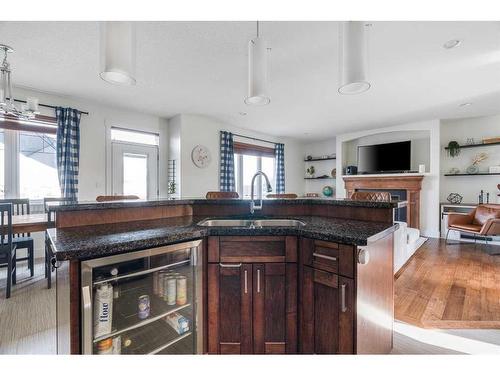 247 Killdeer Way, Fort Mcmurray, AB - Indoor Photo Showing Kitchen With Fireplace