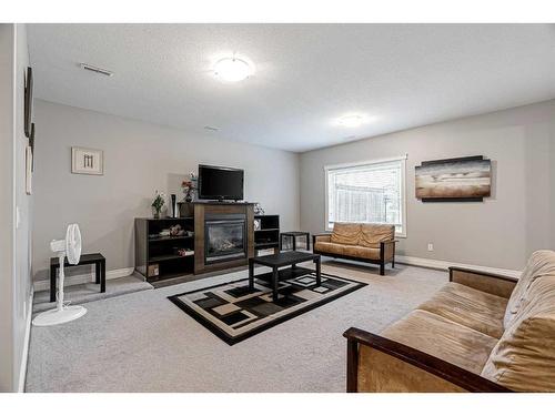 427 Fireweed Crescent, Fort Mcmurray, AB - Indoor Photo Showing Living Room With Fireplace