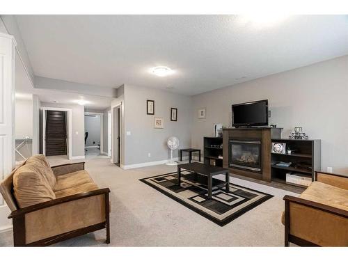 427 Fireweed Crescent, Fort Mcmurray, AB - Indoor Photo Showing Living Room With Fireplace