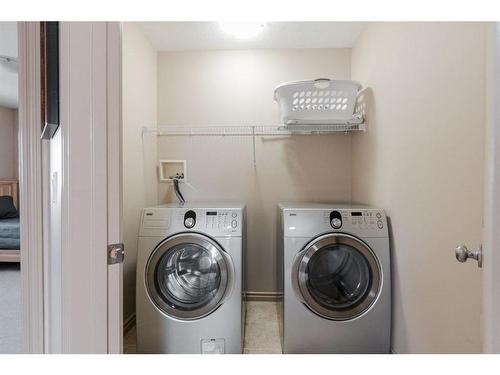 100 Warbler Avenue, Fort Mcmurray, AB - Indoor Photo Showing Laundry Room