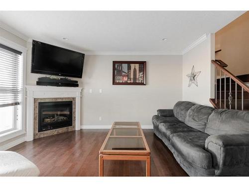 17-193 O'Coffey Crescent, Fort Mcmurray, AB - Indoor Photo Showing Living Room With Fireplace