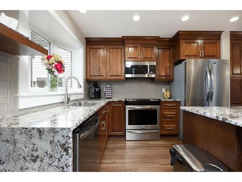 110 Aspenhill Drive, Fort Mcmurray, AB - Indoor Photo Showing Kitchen With Stainless Steel Kitchen With Upgraded Kitchen
