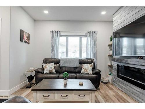 172 Siltstone Place, Fort Mcmurray, AB - Indoor Photo Showing Living Room With Fireplace
