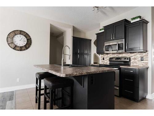 9-300 Sparrow Hawk Drive, Fort Mcmurray, AB - Indoor Photo Showing Kitchen With Upgraded Kitchen