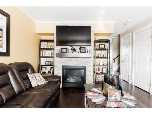 149 Richardson Lane, Fort Mcmurray, AB - Indoor Photo Showing Living Room With Fireplace