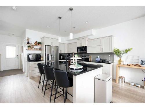 165 Chalifour Street, Fort Mcmurray, AB - Indoor Photo Showing Kitchen With Upgraded Kitchen