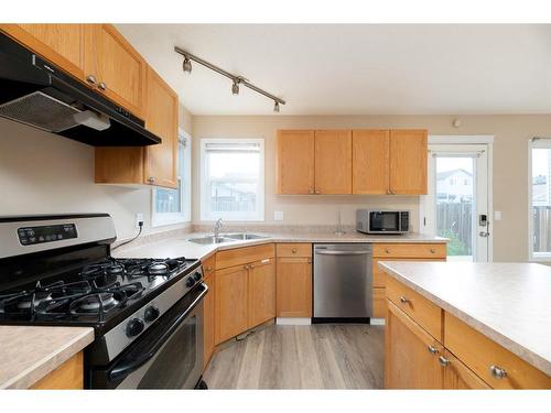128 Paris Crescent, Fort Mcmurray, AB - Indoor Photo Showing Kitchen With Double Sink