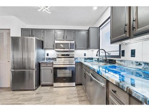146 Mcconachie Crescent, Fort Mcmurray, AB - Indoor Photo Showing Kitchen With Stainless Steel Kitchen With Double Sink