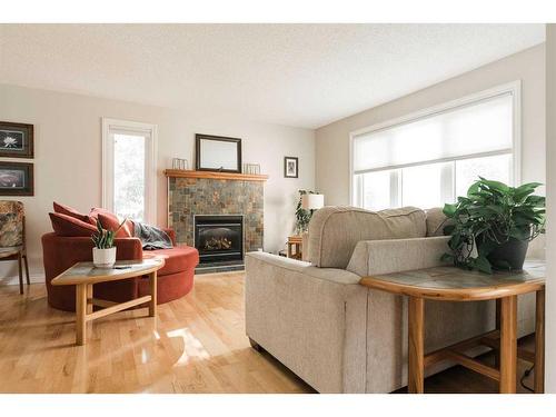 136 Brosseau Crescent, Fort Mcmurray, AB - Indoor Photo Showing Living Room With Fireplace