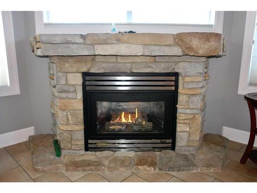 104-9918 Gordon Avenue, Fort Mcmurray, AB - Indoor Photo Showing Living Room With Fireplace