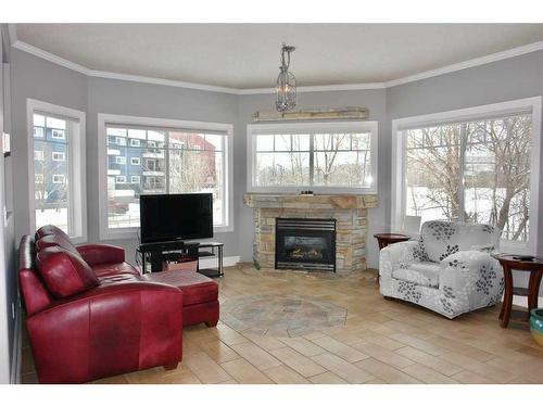 104-9918 Gordon Avenue, Fort Mcmurray, AB - Indoor Photo Showing Living Room With Fireplace