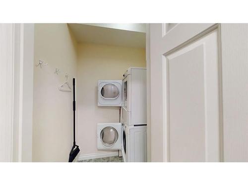 203-10101 Morrison Street, Fort Mcmurray, AB - Indoor Photo Showing Laundry Room