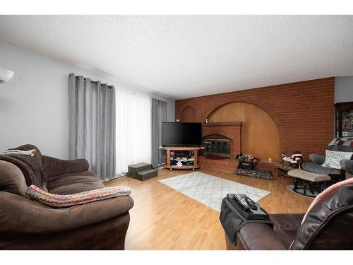 177 Sifton Avenue, Fort Mcmurray, AB - Indoor Photo Showing Living Room With Fireplace