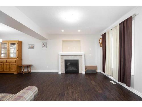 240 Comeau Crescent, Fort Mcmurray, AB - Indoor Photo Showing Living Room With Fireplace