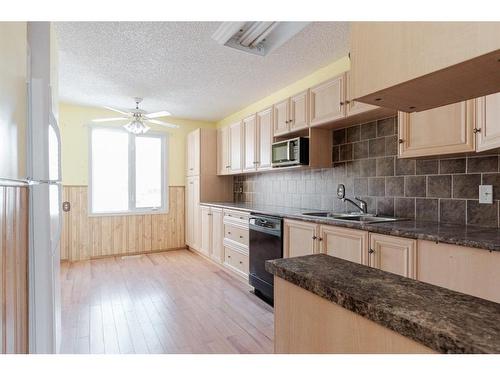154 Bird Crescent, Fort Mcmurray, AB - Indoor Photo Showing Kitchen With Double Sink