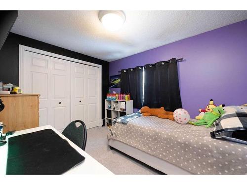 224 Stony Mountain Road, Anzac, AB - Indoor Photo Showing Bedroom