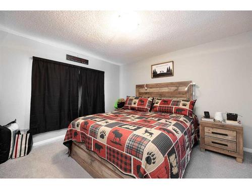 224 Stony Mountain Road, Anzac, AB - Indoor Photo Showing Bedroom