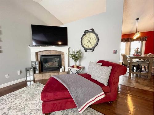 236 Shetland Garden, Fort Mcmurray, AB - Indoor Photo Showing Living Room With Fireplace