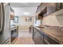 1028-201 Abasand Drive, Fort Mcmurray, AB  - Indoor Photo Showing Kitchen With Double Sink 