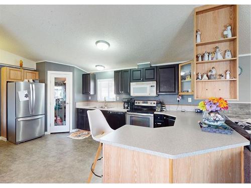 133 Caouette Crescent, Fort Mcmurray, AB - Indoor Photo Showing Kitchen