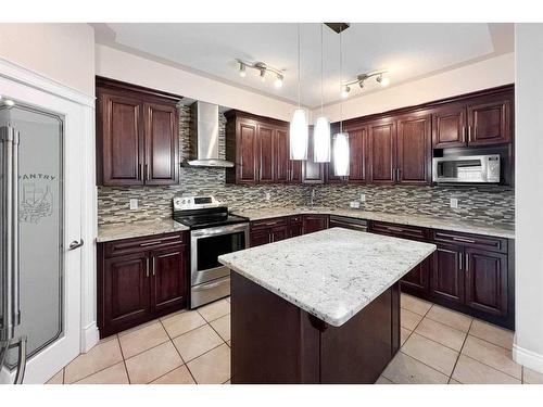 205 Heritage Drive, Fort Mcmurray, AB - Indoor Photo Showing Kitchen With Upgraded Kitchen