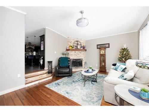 185 Card Crescent, Fort Mcmurray, AB - Indoor Photo Showing Living Room With Fireplace