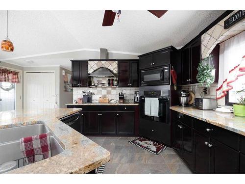 185 Card Crescent, Fort Mcmurray, AB - Indoor Photo Showing Kitchen With Double Sink