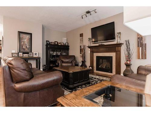 158 Pearl Bay, Fort Mcmurray, AB - Indoor Photo Showing Living Room With Fireplace