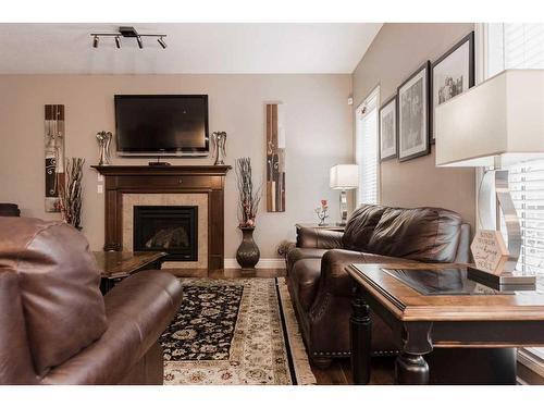 158 Pearl Bay, Fort Mcmurray, AB - Indoor Photo Showing Living Room With Fireplace