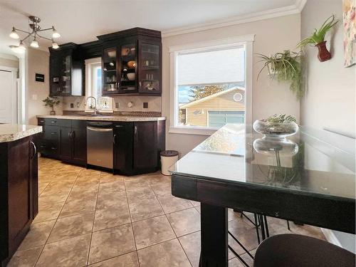 23 Moberly Crescent, Fort Mcmurray, AB - Indoor Photo Showing Kitchen With Double Sink