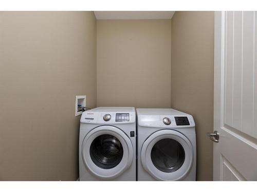 322 Grosbeak Way, Fort Mcmurray, AB - Indoor Photo Showing Laundry Room