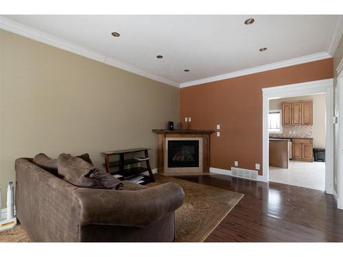 322 Grosbeak Way, Fort Mcmurray, AB - Indoor Photo Showing Living Room With Fireplace