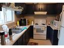 1600-21 Macdonald Drive, Fort Mcmurray, AB  - Indoor Photo Showing Kitchen With Double Sink 