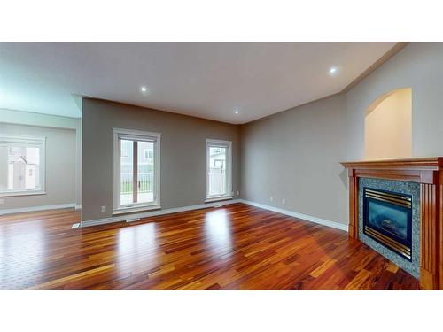 125 Paris Crescent, Fort Mcmurray, AB - Indoor Photo Showing Living Room With Fireplace