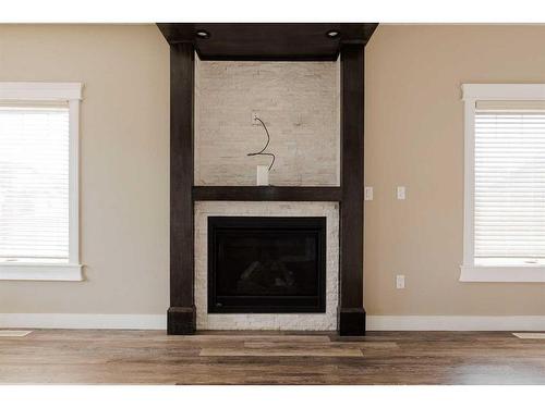 220 Siltstone Place, Fort Mcmurray, AB - Indoor Photo Showing Living Room With Fireplace