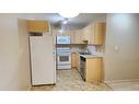 1411-200 Lougheed Drive, Fort Mcmurray, AB  - Indoor Photo Showing Kitchen With Double Sink 