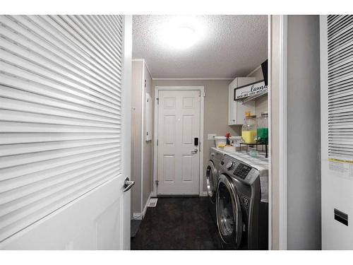 100 Ash Way, Fort Mcmurray, AB - Indoor Photo Showing Laundry Room