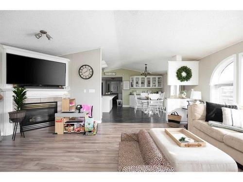100 Ash Way, Fort Mcmurray, AB - Indoor Photo Showing Living Room With Fireplace