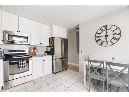 241 Bird Crescent, Fort Mcmurray, AB - Indoor Photo Showing Kitchen With Stainless Steel Kitchen