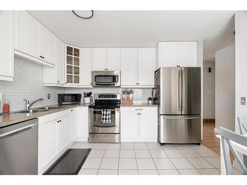 241 Bird Crescent, Fort Mcmurray, AB - Indoor Photo Showing Kitchen With Stainless Steel Kitchen With Double Sink