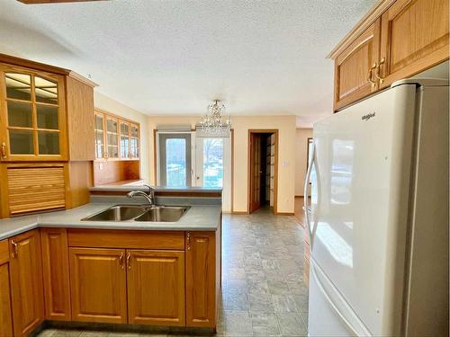 10014 102 Avenue, Lac La Biche, AB - Indoor Photo Showing Kitchen With Double Sink