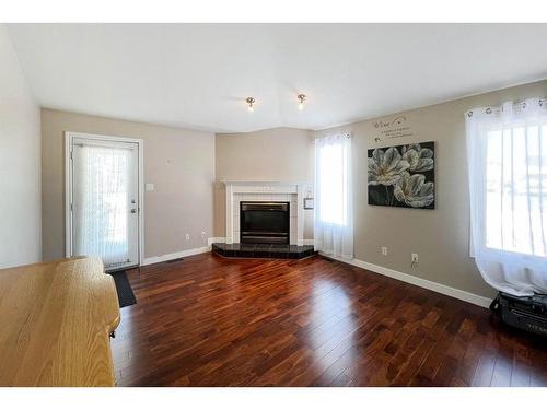 209 Blanchett Road, Fort Mcmurray, AB - Indoor Photo Showing Living Room With Fireplace