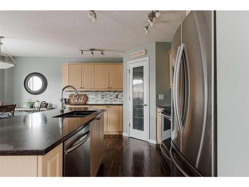 146 Iris Way, Fort Mcmurray, AB - Indoor Photo Showing Kitchen With Stainless Steel Kitchen With Double Sink