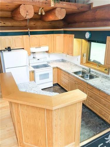 153 & 157 Lakeshore Drive, Lac La Biche, AB - Indoor Photo Showing Kitchen With Double Sink