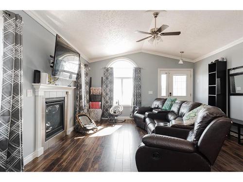 781 Beacon Hill Drive, Fort Mcmurray, AB - Indoor Photo Showing Living Room With Fireplace
